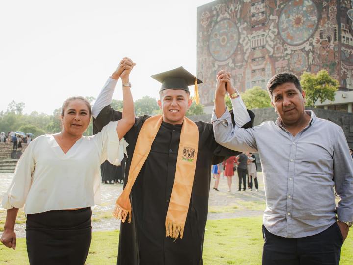 graduate with mother and father