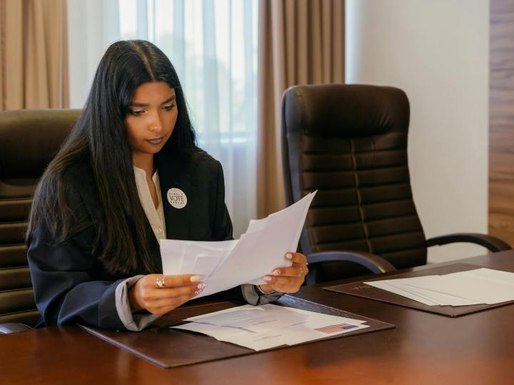 professional woman looking at documents