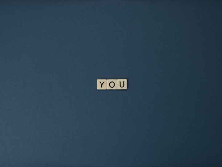 close up shot of text on a blue surface