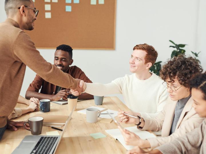photo of people doing handshakes